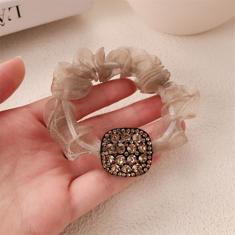 990. Versatile zircon hairband.