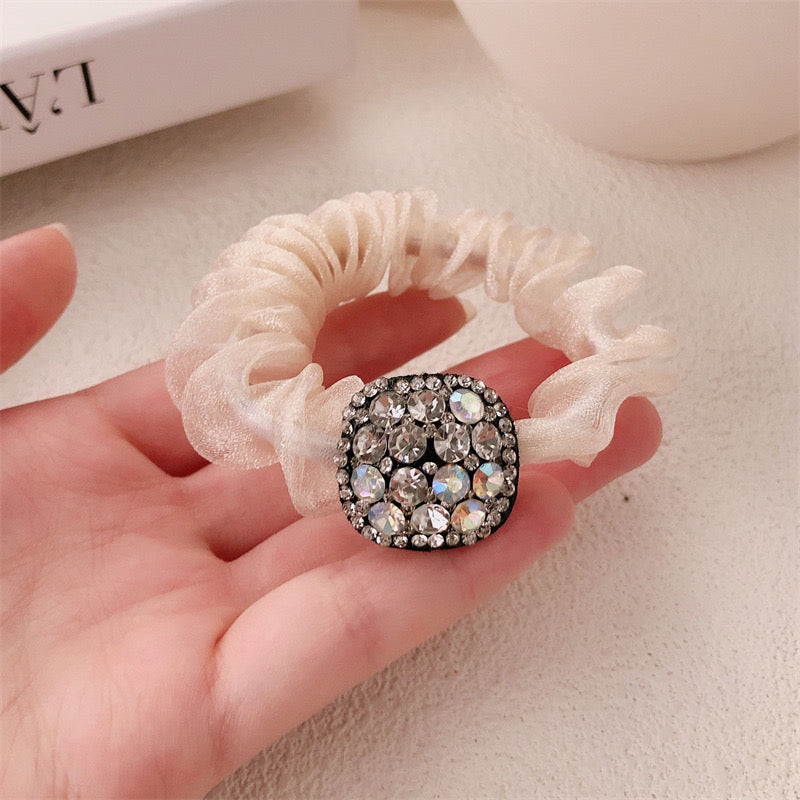 990. Versatile zircon hairband.