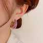 6.Purple earrings