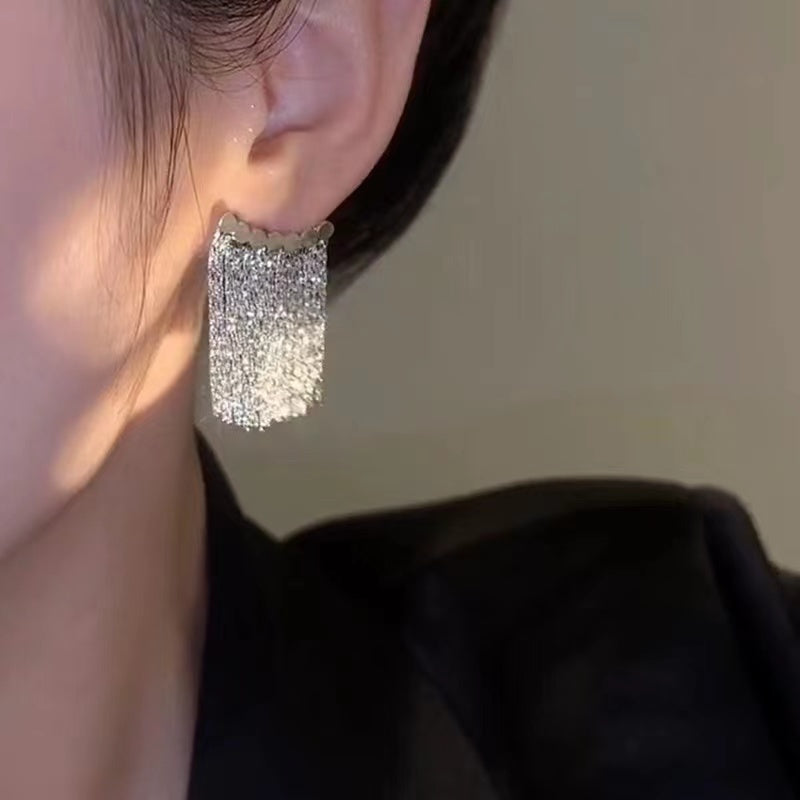 23. Aretes de borla de galaxia 